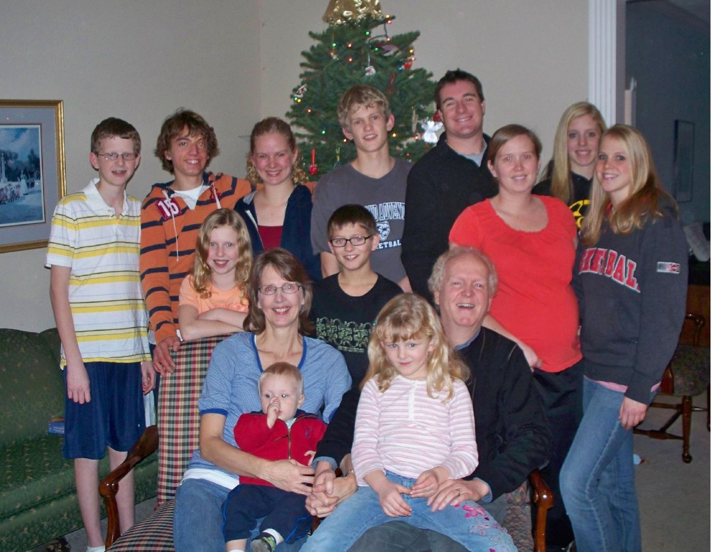 Photo from the 2009 Christmas letter: the King family in front of the Christmas tree